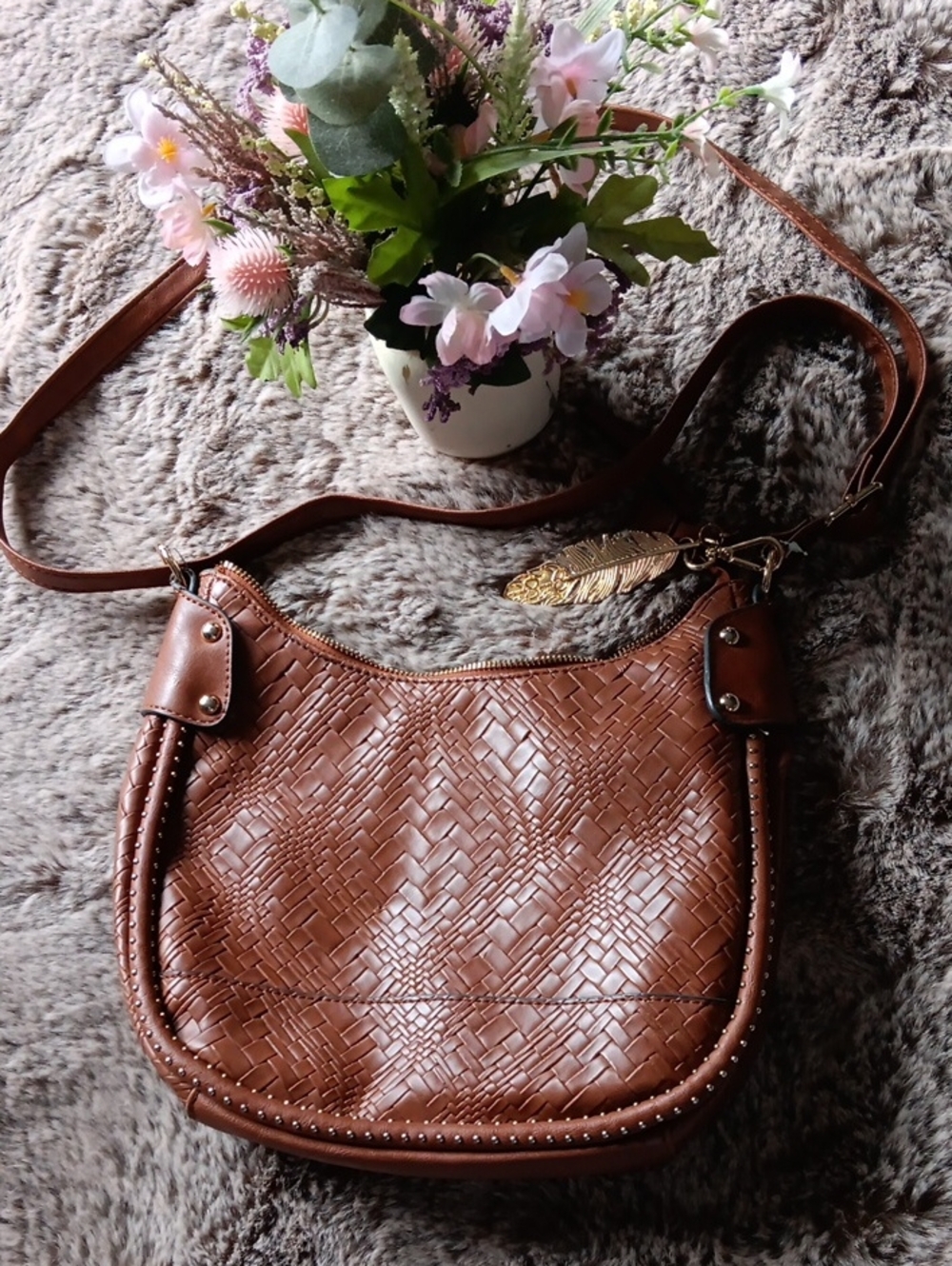 Jessica Simpson Brown Woven Leather Crossbody with Gold Feather Charm